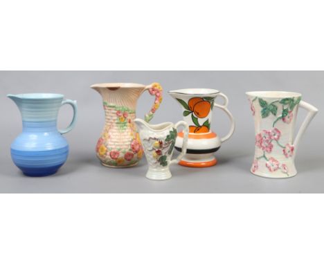 Five ceramic jugs to include Arthur Wood, Shelley, Wade and Mailing.