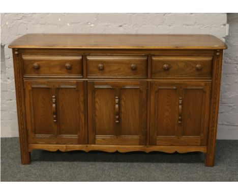 An Ercol Golden Dawn sideboard.