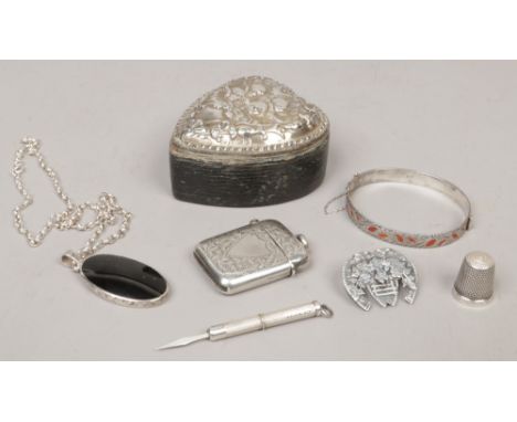 A collection of silver items to include silver top trinket box, assayed Birmingham 1904, silver match stick case, assayed Bir