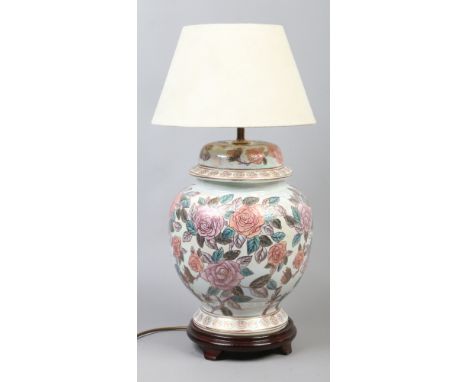 A large baluster shape vase with floral decoration formed as a table lamp, height 60cm with shade.