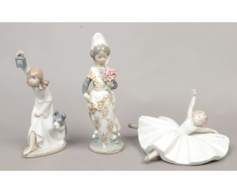 A Lladro figure of a girl, along with two Nao figures one of a young ballerina the other a girl and her dog.