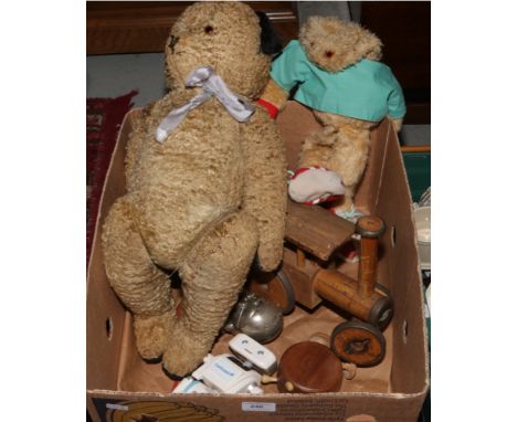 A box of vintage toys including a plush jointed teddy bear, wooden traction engine and Gordon the Gopher puppet etc.