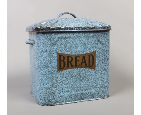 A twin handle enamel bread bin.