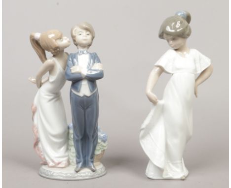 A Lladro porcelain figure group of a courting couple, along with Nao example of a young girl in a dress.