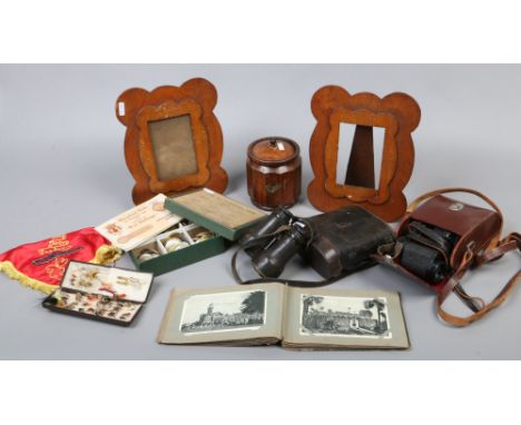A quantity of vintage collectables including fishing flies, oak tea caddy, cased binoculars, monochrome postcards and photogr