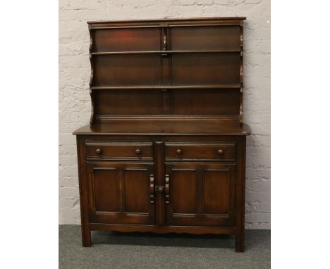 An Ercol panelled kitchen dresser.