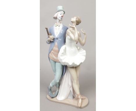A large Lladro figure group of a clown and ballerina, approximate height 45cm.Condition report intended as a guide only.Good 