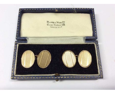 Pair 9ct gold cufflinks, the oval panels with engine turned decoration, in fitted caseCondition report: Fully hallmarked 9ct 