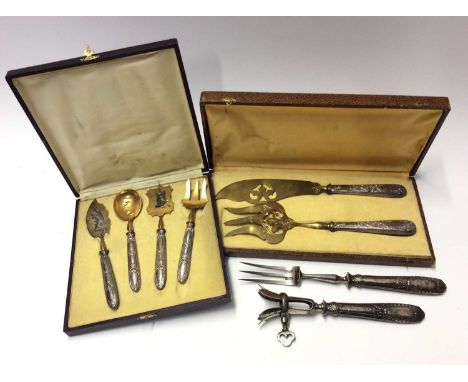 French silver handled and gilt metal servers and flat ware, together with French silver handled meat fork and holder set