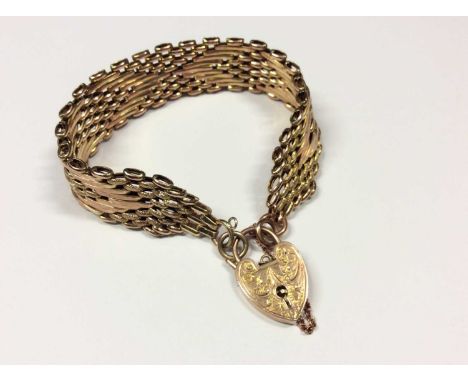 9ct yellow and rose gold gate bracelet with engraved padlock claspCondition report: Padlock clasp stamped ‘9ct gold’ and some
