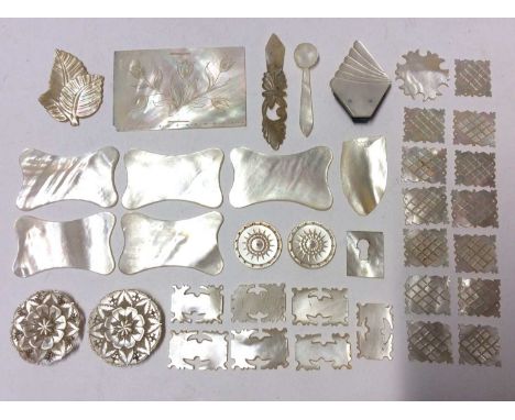 Group of mother of pearl items to include carved items and sewing items