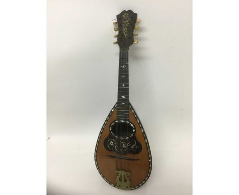 Early 20th century Italian barrel backed mandolin, with mother of pearl inlayCondition report: Label to interior reads 'Premi