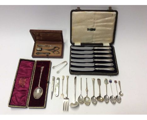 Group silver flatware including various silver spoons, silver fork, silver and mother of pearl fruit knife, sterling silver p