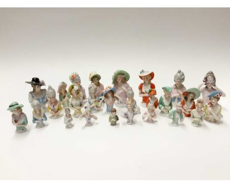 Collection of continental porcelain half dolls, vintage peg doll and one other large doll
