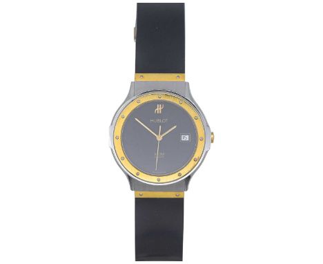 HUBLOT - An MDM gentleman's steel and gold mid-size quartz calendar wristwatch. Ref. S152102, serial number 167988, the signe