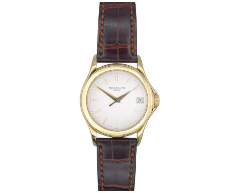 PATEK PHILIPPE - A fine Calatrava 18k gentleman's automatic wristwatch. The signed silvered dial with gilt baton markers, gil
