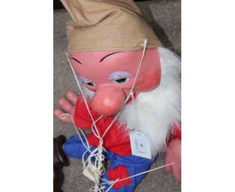 WALT DISNEY PRODUCTIONS PELHAM PUPPET
modelled as Sleepy from Snow White and the Seven Dwarves, 50cm long; the handles stampe