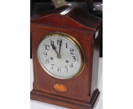 EDWARDIAN MAHOGANY LINE INLAID MANTEL CLOCK
the silvered circular dial with Arabic numerals, striking on a gong, with pendulu