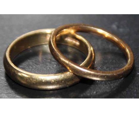TWO 22CT GOLD WEDDING BANDS
both with Sheffield 22ct hallmarks, the larger size M-N, the smaller K-L, 7.2g gross
