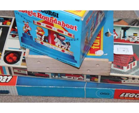 TWO VINTAGE LEGO SYSTEM SETS c.1969
with their origibal boxes; together with a Corgi musical toy in the form of The Magic Rou