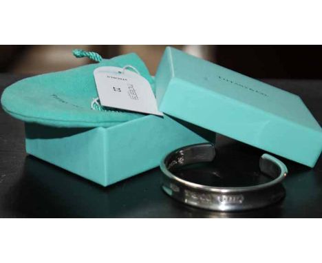 STERLING SILVER TIFFANY & CO BANGLE
1997, marked 925 for silver, 53.6g, boxed
