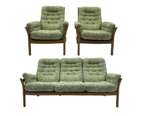 Ercol - ash framed three seat sofa (W193cm, H96cm, D85cm), and pair of matching armchairs (W81cm), with upholstered loose cus