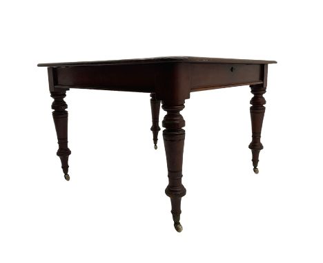 Late Victorian mahogany extending dining table, with additional leaf, raised on turned supports with brass cup and ceramic ca