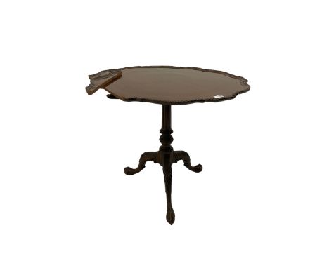 Chippendale design mahogany tilt top occasional table, with reeded column and leaf carved triple splay supports with ball and