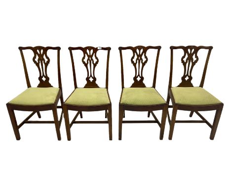 Four 19th century Chippendale design dining chairs, the shaped cresting rail over pierced splat, drop n upholstered seatsDime