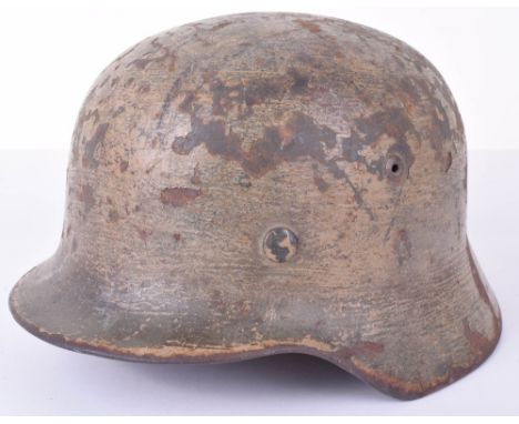 WW2 German Normandy Camouflaged M-35 Steel Combat Helmet, a superb untouched as found camouflaged German combat helmet. The s