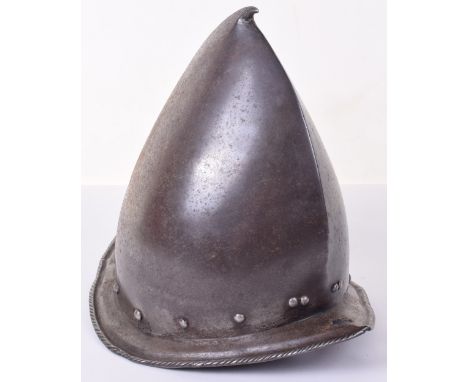 Spanish Morion or Cabaset c.1580, of good form, the tall polished skull raised from a single plate with prominent pear stalk 