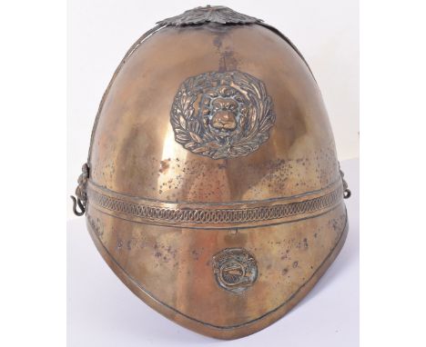 Indian Artillery Dress Helmet, brass shell with lion head within wreath helmet plate to the centre, small artillery badge to 
