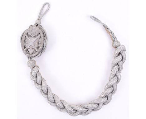 WW2 German Army Marksmans Lanyard, fine knotted bullion wire lanyard with metal insignia to the top section. Remains in good 