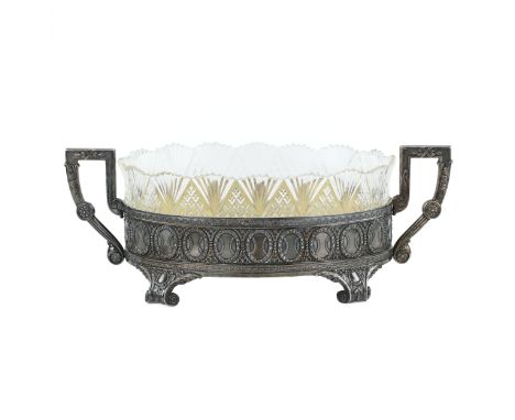 An exquisite silver vase with a crystal insert, made by the famous Russian jewelry firm of I. Khlebnikov, supplier to the Imp
