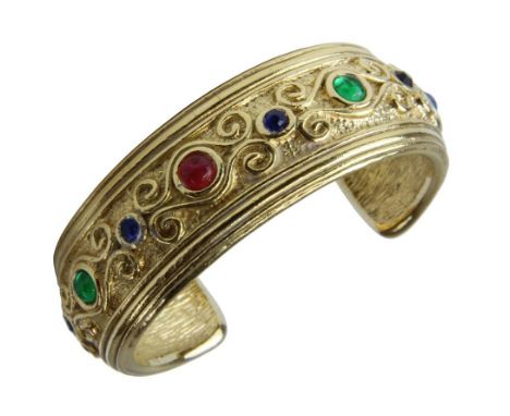 Christian Dior Armreif mit Farbsteinen, Paris/Germany um 1990, breiter vergoldeter Armreif mit verschiedenfarbigen Steinen, i