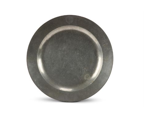 A GEORGE I PEWTER RIM PLATE BY THOMAS RIDDING   EARLY 18TH CENTURY  Engraved with the Walpole crest, a Saracen's head in prof