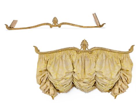 TWO SIMILAR GILT BRASS CURTAIN PELMETS IN REGENCY STYLE 19TH CENTURY  the larger 23cm high, 220cm long, 43cm deep  The smalle