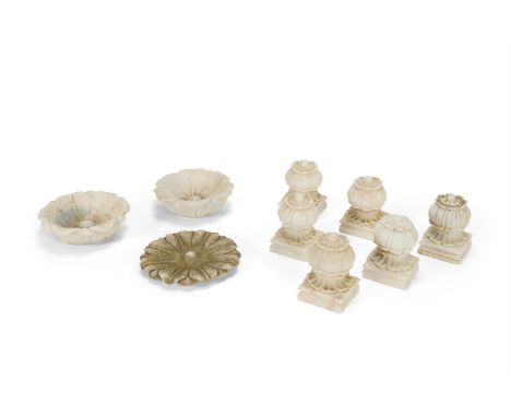 A SET OF SIX WHITE MARBLE CARPET WEIGHTS  INDIAN, LATE 20TH CENTURY  And a pair of lotus shaped bowls and a flower pattern ro