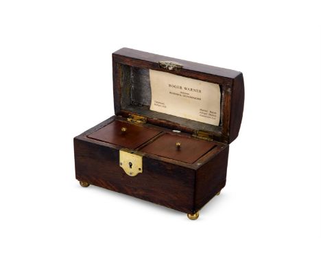 A GEORGE III BRASS-MOUNTED BOTANY BAY OAK (CASUARINA) TEA CADDY CIRCA 1800  The domed lid with a loop handle, twin compartmen
