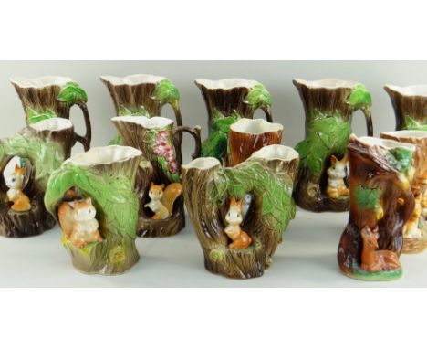 COLLECTION OF WITHERNSEA POTTERY 'FAUNA' JUGS &amp; SPILL VASES, each modelled with a woodland animal and an East Gate spill 