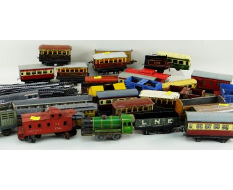 ASSORTED TINPLATE 'OO' GUAGE TRAINS, BY HORNBY, BRIMTOY, &amp; LIONEL together with some Dublo track and Hornby plastic carri
