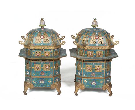 A PAIR OF CLOISONNE ENAMEL PAGODA FORM CENSERS
Late 20th Century, of square form with cut corners on four elephant mask suppo