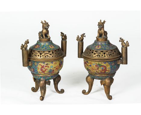 A PAIR OF CLOISONNE ENAMEL TRIPOD CENSERS
Late 20th Century, with mythical beast finial on three elephant head supports 

All