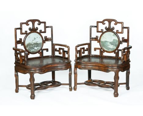 A PAIR OF LARGE MARBLE INSET AND HARDWOOD ARMCHAIRS The openwork back rest with central circular variegated marble panel, the