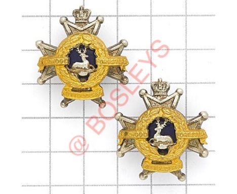 Sherwood Foresters pair of EIIR Officer’s collar badges circa 1953-58. Facing pair of silvered, gilt and blue enamel examples