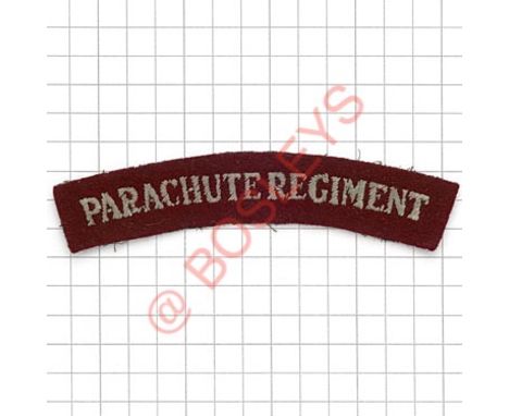 Badge. PARACHUTE REGIMENT cloth shoulder title. Light blue embroidered on maroon VGC 