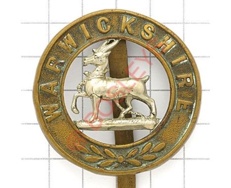 Warwickshire Regiment post 1881 bi-metal pagri badge. Die-stamped. GC Long slider 
