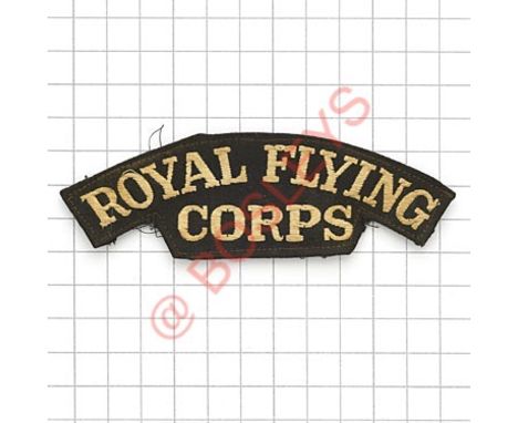 Badge. ROYAL FLYING / CORPS scarce WW1 canvas shoulder title. White serif letters embroidered on black canvas. Removed from u