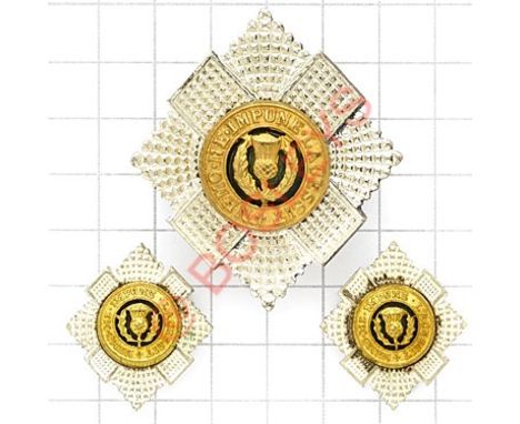 Scottish. Royal Scots Officer’s cap and pair of collar badges. Each a die-cast silver plated thistle star with gilt mount and