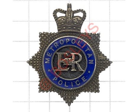 Metropolitan Police post 1953 Senior Officer’s silver cap badge Die-cast silver and blue enamel crowned star stamped ‘STERLIN